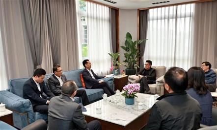 涪城区与008PG国际集团举行事情对接座谈会