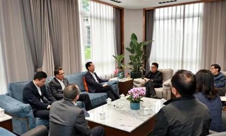 涪城区与008PG国际集团举行事情对接座谈会